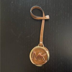 Michael Kors Brown and Gold Purse Hang Tag